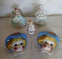 Group shot of all five ceramic figurines