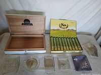 Atabey cigar box open, Napa box with 10 tubes, ashtrays arrayed