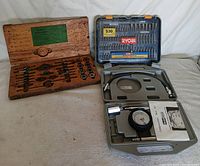 All three tool sets: Lucky hex set, Ryobi bit kit, compression tester