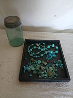 Jar and turquoise items overview