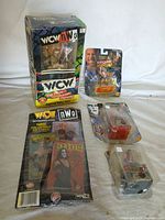 All five packaged WCW items grouped