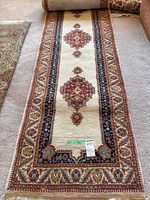 Full view of rug runner showing complete design and size label