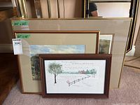 All three framed artworks stacked showing relative sizes