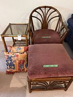 Chair, ottoman, table and pillow group shot