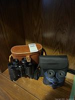 Both binocular pairs with cases