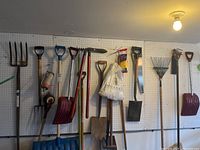 Overall view of tools on pegboard wall