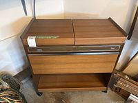 Front view of Royal Hostess warming station cart closed