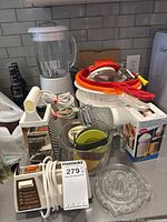 Overall lot showing blender, hand mixer, grater, strainers and other tools