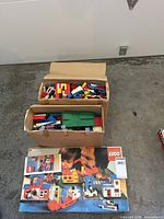 Set 365 box front and two cardboard boxes of loose LEGO pieces