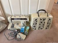 Jones 481 sewing machine with foot pedal, accessories and case