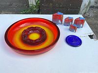 Group shot of ashtray, coaster and four elephant figurines
