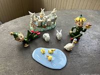 All figurines arranged on table