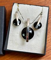 Necklace and earrings in presentation box
