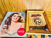 Both advertising pieces side by side for overview