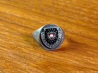 Front view of sterling signet ring with Concordia crest