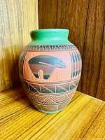 Front view showing bear motif and geometric designs