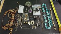 Overview of entire jewellery lot laid out on table