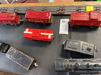 Overview of locomotives, cars, tender, and track