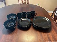 Full set arranged on table showing quantity and overall appearance