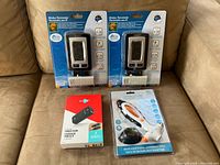 Front view showing two La Crosse wireless thermometers, Blue Hive power bank box, and multi-function emergency tool package