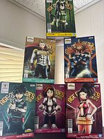 Front view of six My Hero Academia Age of Heroes figure boxes displayed
