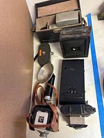 Top view of all cameras and case