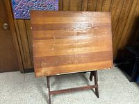 Front view of wood drafting table showing top surface