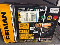 Front of sealed Firman P03603 generator box displaying product image and key specifications