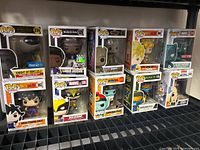 Shelf view showing all ten boxed Funko Pop figures