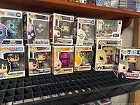 Wide view of all boxed figures on shelf