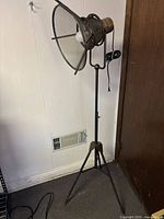 Full view of tripod floor lamp showing overall structure and condition