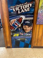 Full view of Jeff Gordon Pepsi Racing plexiglass sign leaning against wall
