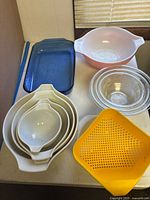 Overview of all 11 Pyrex pieces on table