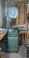 Full view of General International 14" band saw on wheeled cabinet