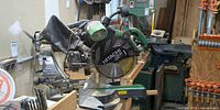 Overall view of Hitachi C12LSH miter saw on bench