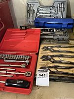 Group shot of all tool sets including Snap-On case, torque wrench case, Craftsman Robo Grip boxes, gray wrench case
