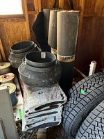 Overall lot showing felt rolls, plastic vents, shingle bundles