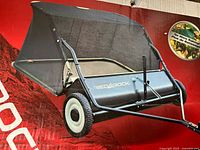 Box front showing image of assembled Red Rock 38-inch lawn sweeper