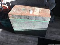 Front view of the metal-clad wood tool box