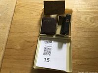 Open case showing hymn book, Bible, slipcase