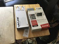 Both boxed items on table