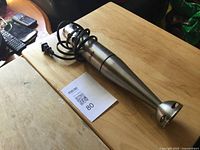 Full view of Oster immersion blender on table