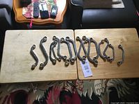 All 12 specialty offset wrenches laid out on tables