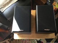 Front view of both Paradigm speakers with grilles attached