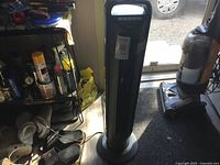 Full view of Seville Classics tower fan standing on base