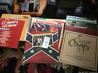 Stack of vinyl albums showing Alabama, Super Country ’83 and others