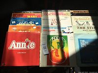 All twelve soundtrack LPs laid out to show front covers