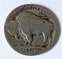 Reverse side showing buffalo design and FIVE CENTS legend, heavy wear