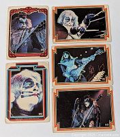 All five KISS trading cards laid out