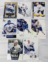 Eight Toronto Maple Leafs cards laid out